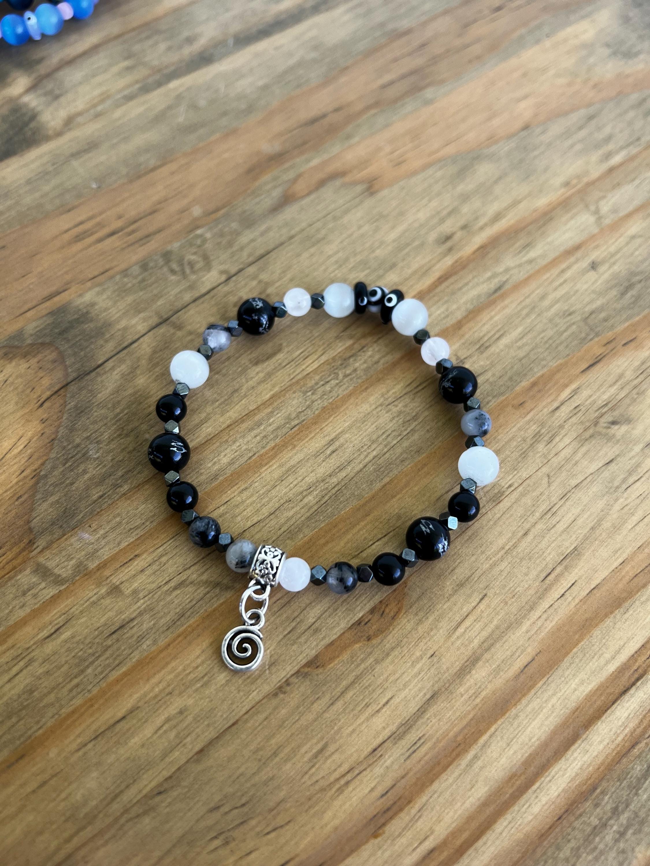 Black Dragon Onyx + Tourmalated Quartz Evil Eye Crystal Bracelet